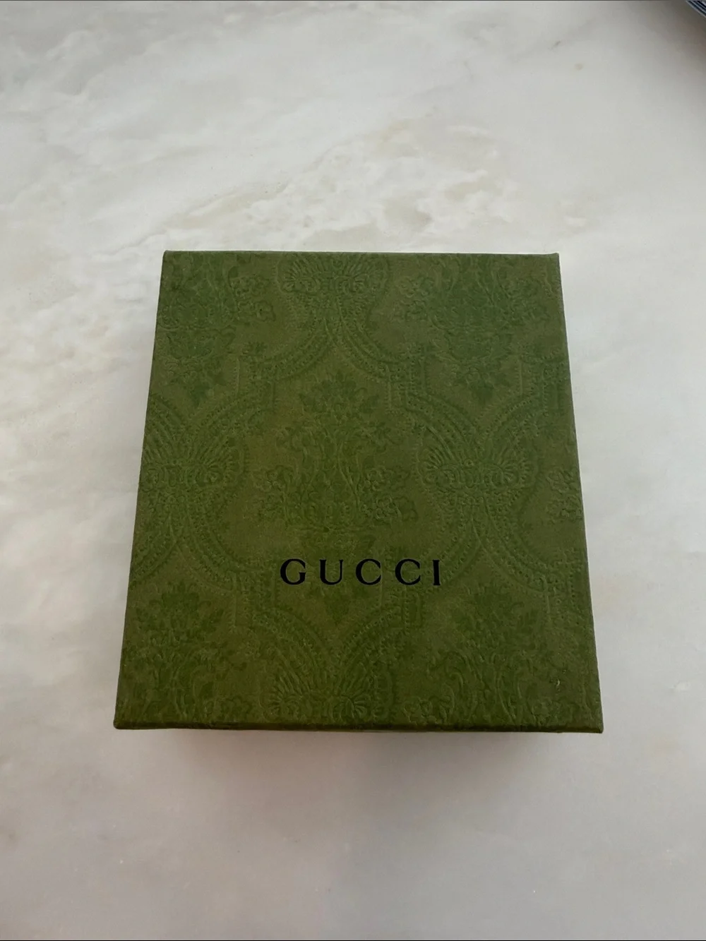 Gucci Black Leather Bi-Fold Wallet with Subtle GG Emblem